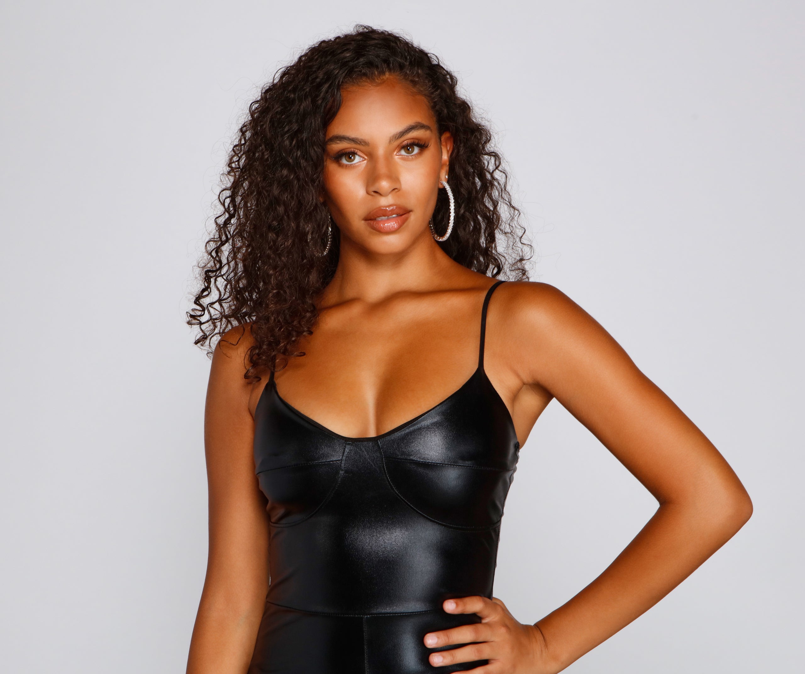 Sleek And Mysterious Faux Leather Catsuit - Image 3