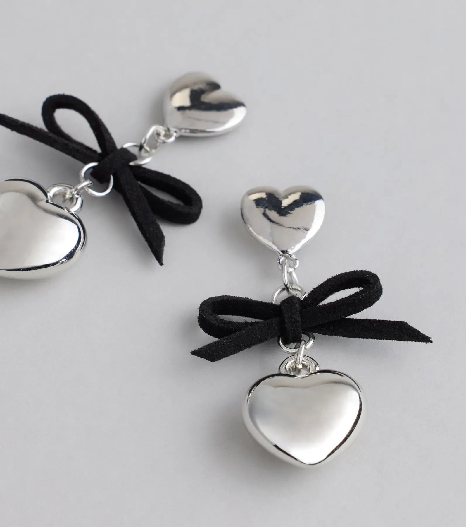 Sweet Talker Heart And Bow Drop Earrings - Image 2