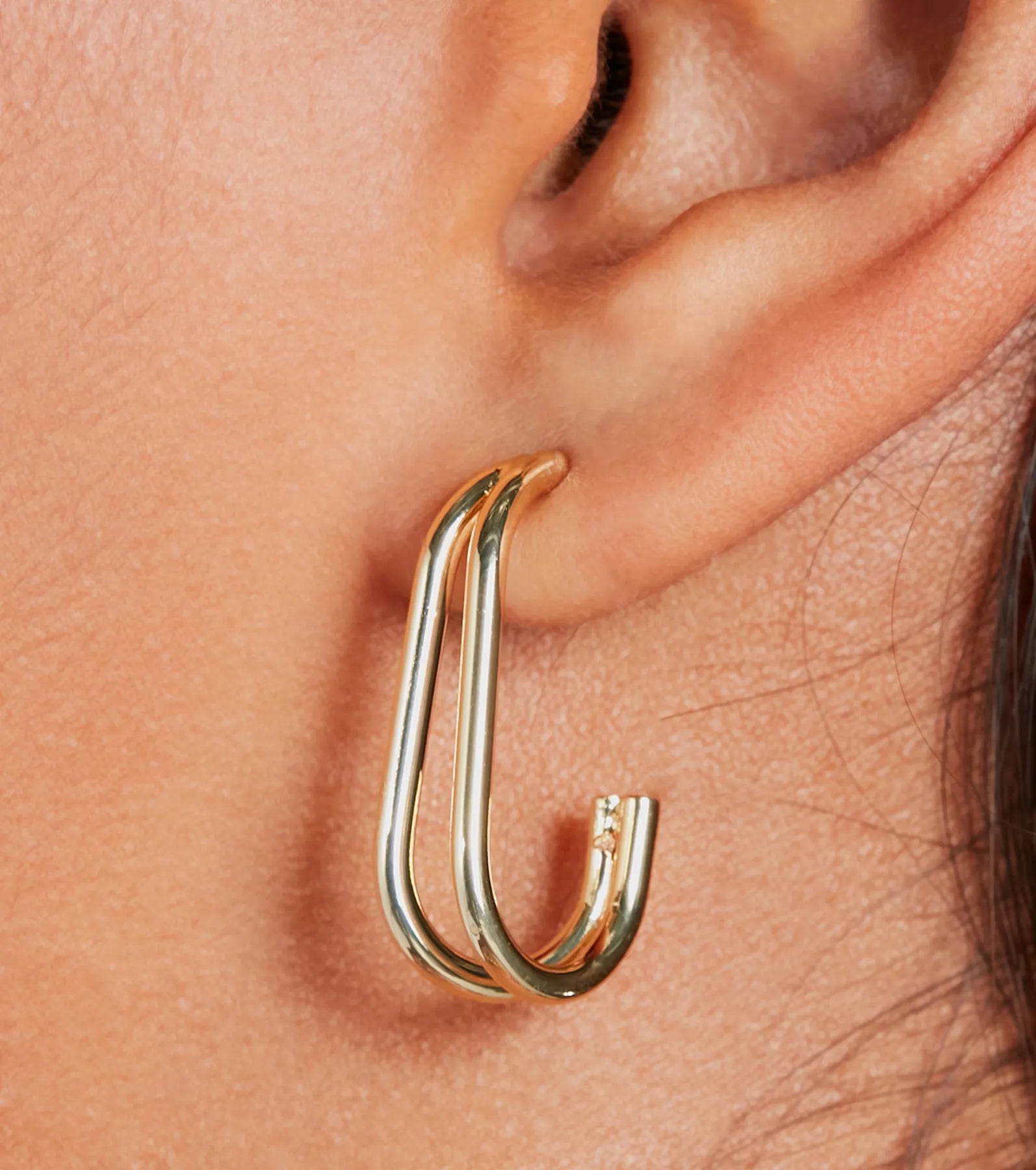 Gleaming 14K Gold Plated Curved Hoop Earrings - Image 2