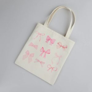 About A Girl Bow Canvas Tote Bag