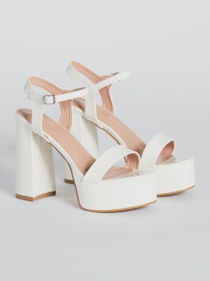 Plot Twist Patent Platform Block Heels