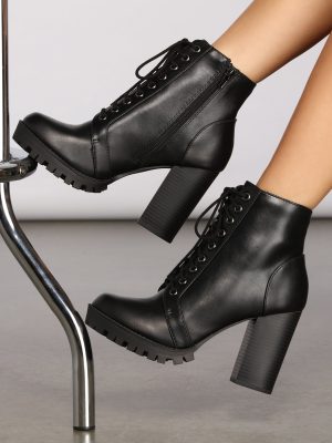 Edgy Glam Lace-Up Booties